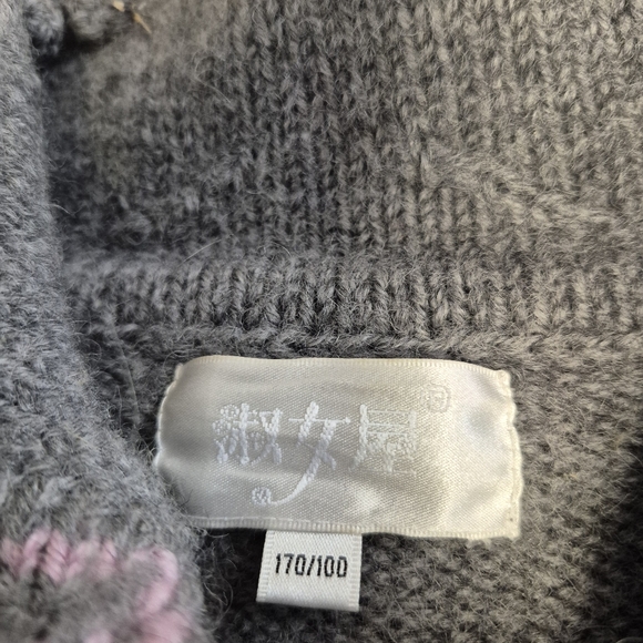 Gray knit  popcorn-stitch baby cardigan with a pink scalloped trim.  - Picture 6 of 6